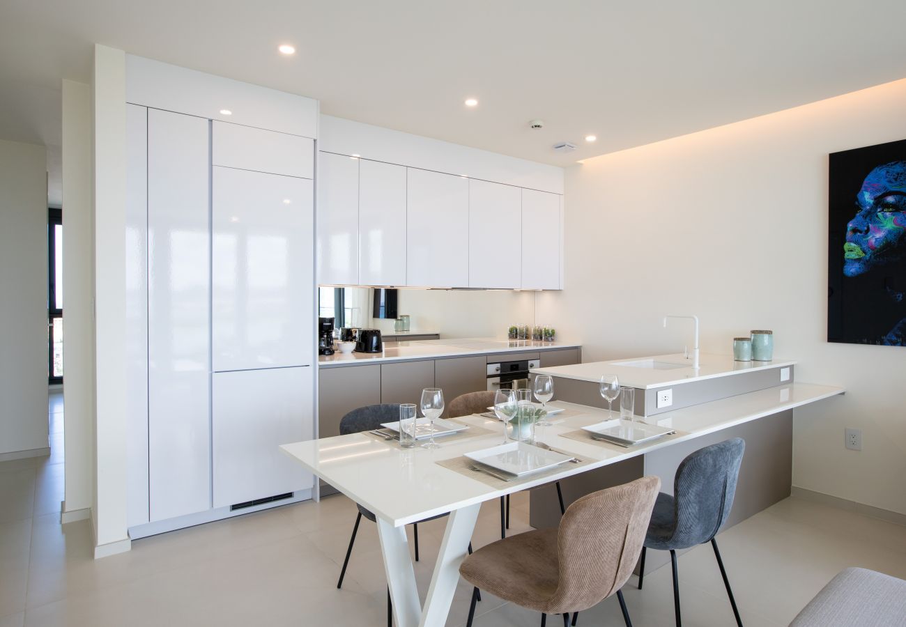 Modern and spacious kitchen with dining table
